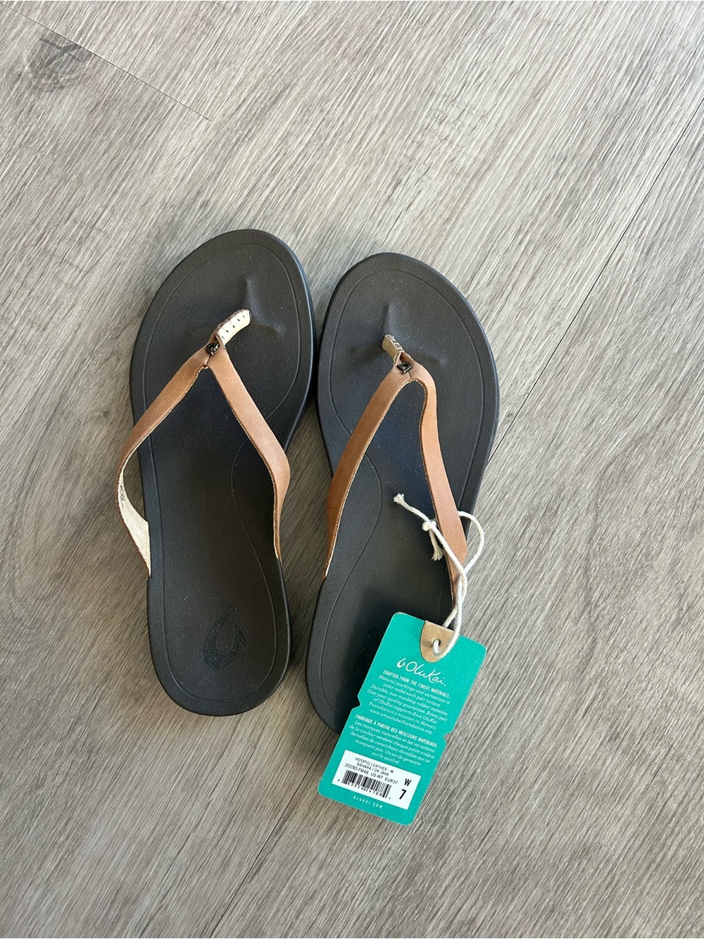 OluKai Women's Tan Strap Flip Flops with Black Footbed - Picture 3 of 6